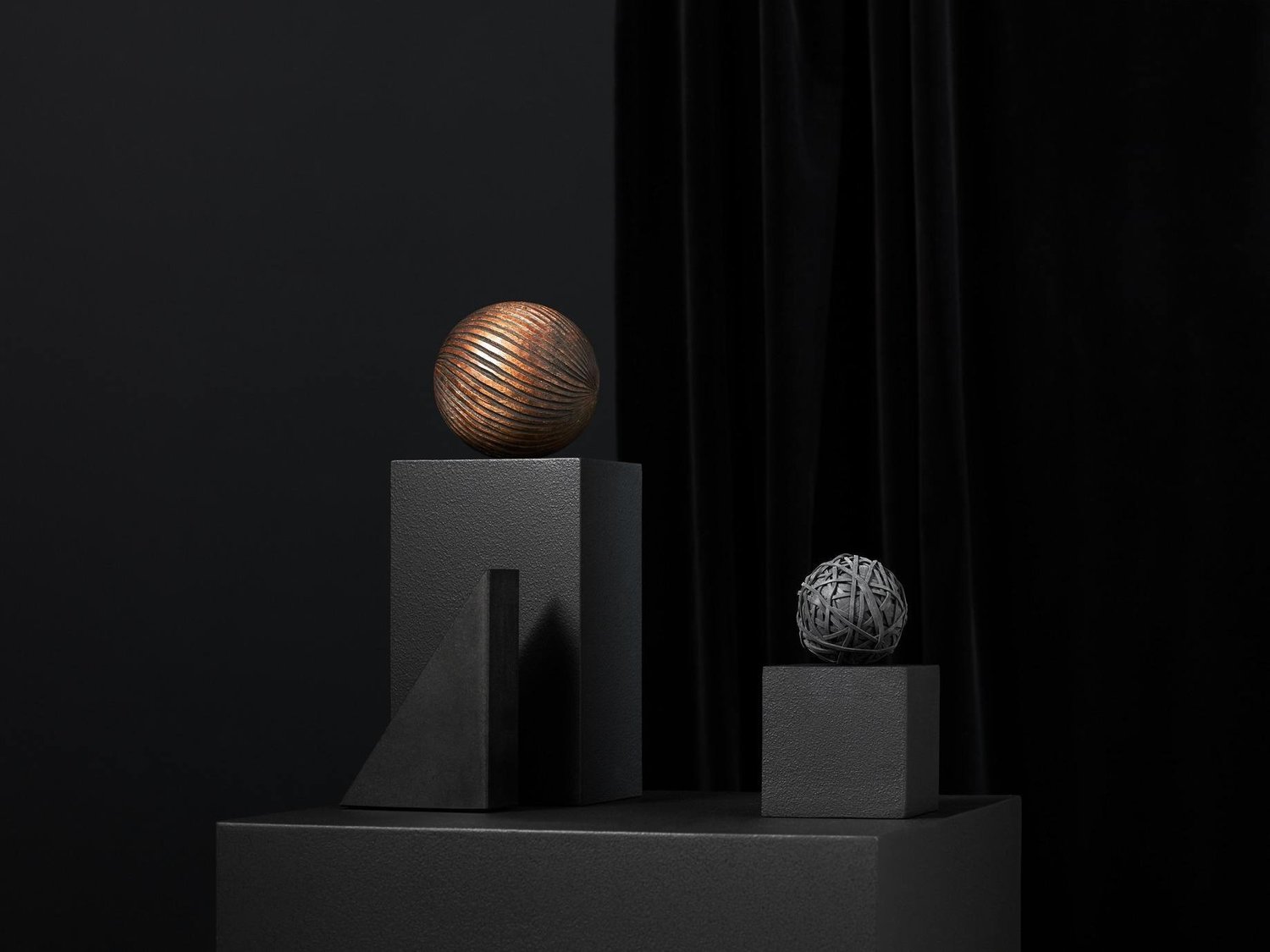 Sculptural forms rising on platforms